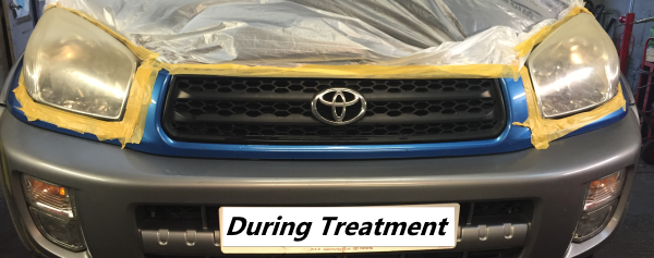 Toyota during photo with partially cloudy headlights